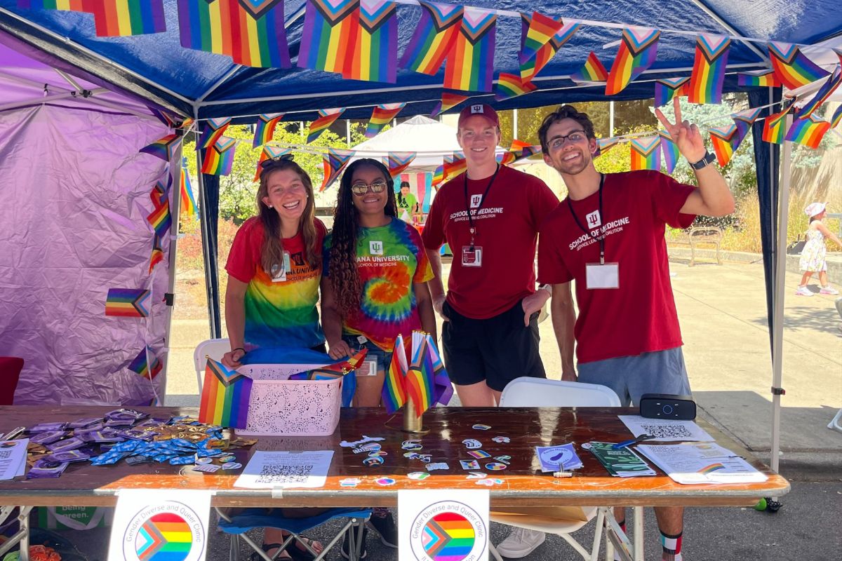 Students affiliated with IU School of Medicine's Gender Diverse and Queer Clinic at Bloomington Pridefest.