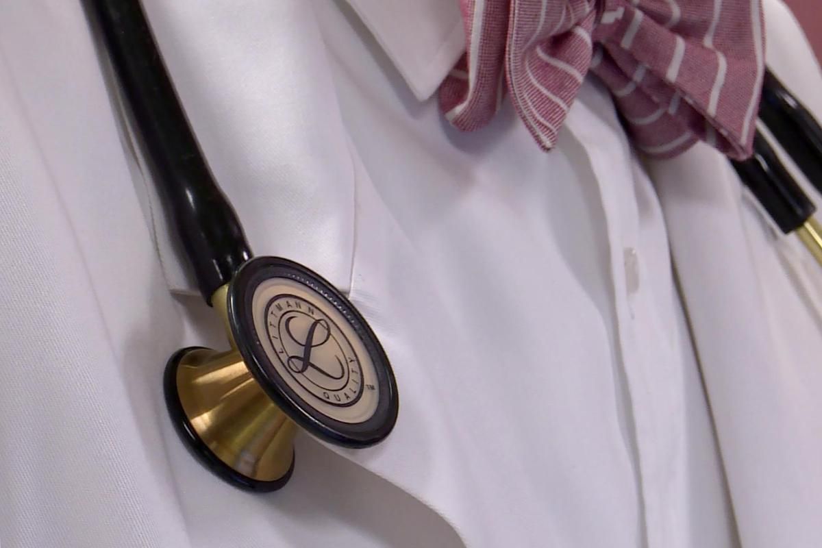A generic shot of a doctor's chest with a stethoscope.