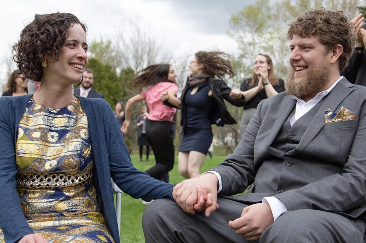 Liana Wolk (left) and Owen Marshall (right) at their wedding in May 2019. Marshall is one of an estimated 5 million Americans stuck in the "family glitch."