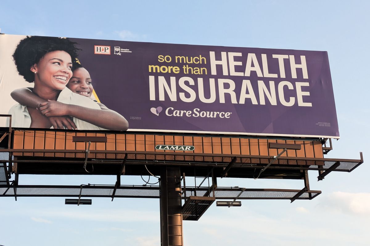 A billboard advertising Caresource and the Healthy Indiana Plan, or HIP, that reads "So much more than Health Insurance."