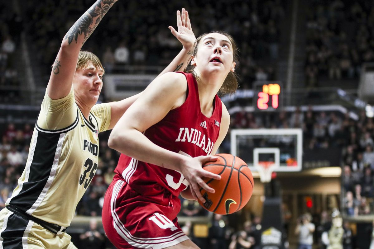 Indiana's Mackenzie Holmes looks to get a shot off inside against Purdue Sunday.