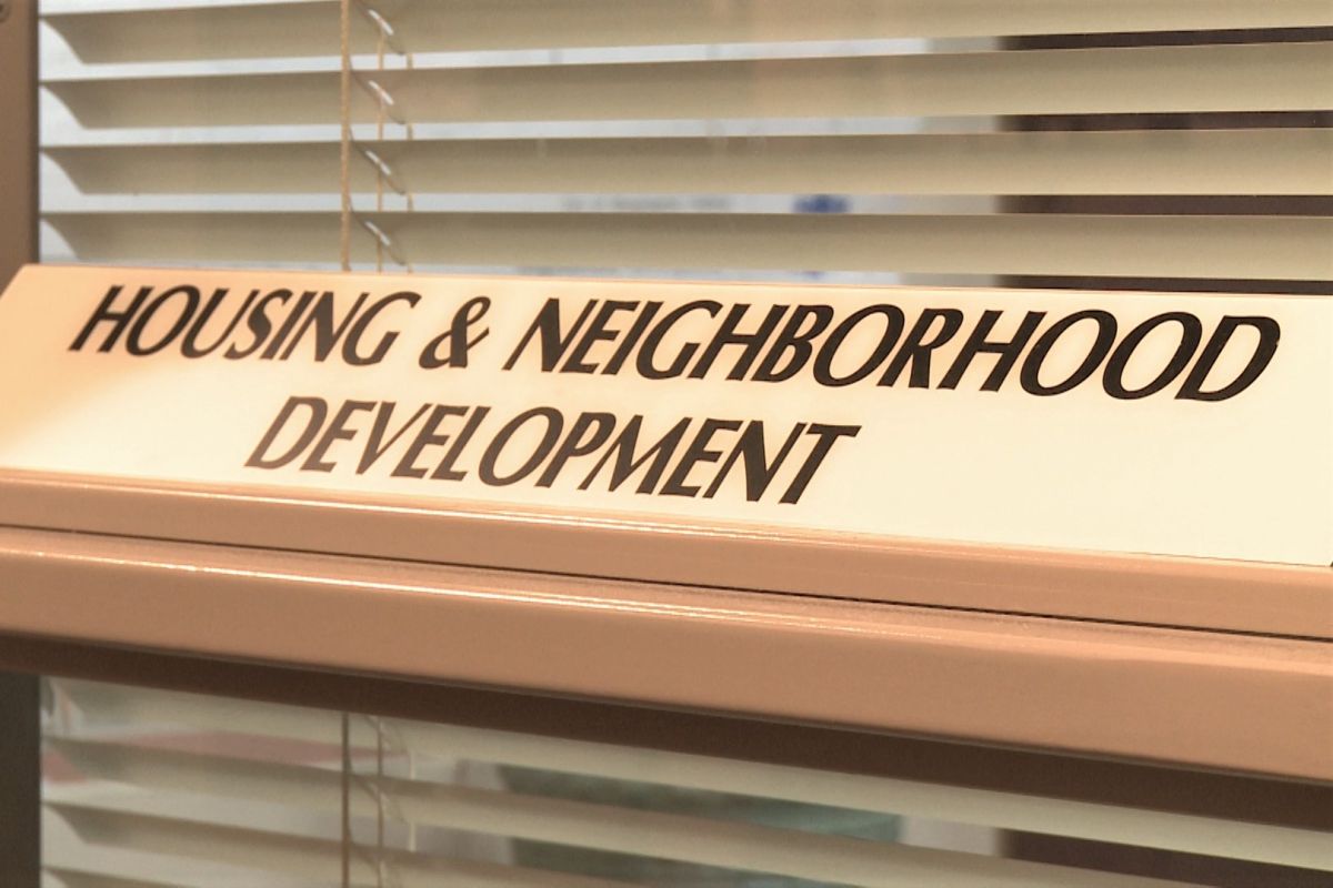 A housing and neighborhood development sign. 