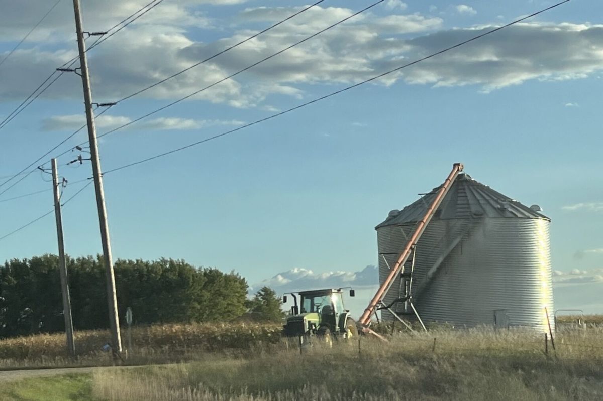 A farmer stores grain near Eldridge, Iowa