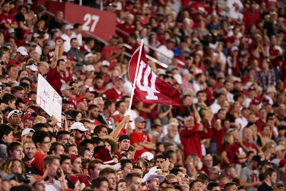 iu sports with students and flags