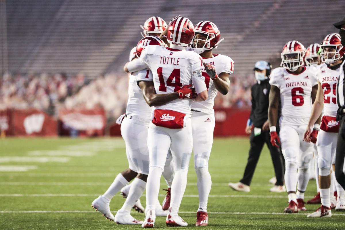 Indiana quarterback Jack Tuttle celebrates a touchdown with teammates at Wisconsin last Saturday.