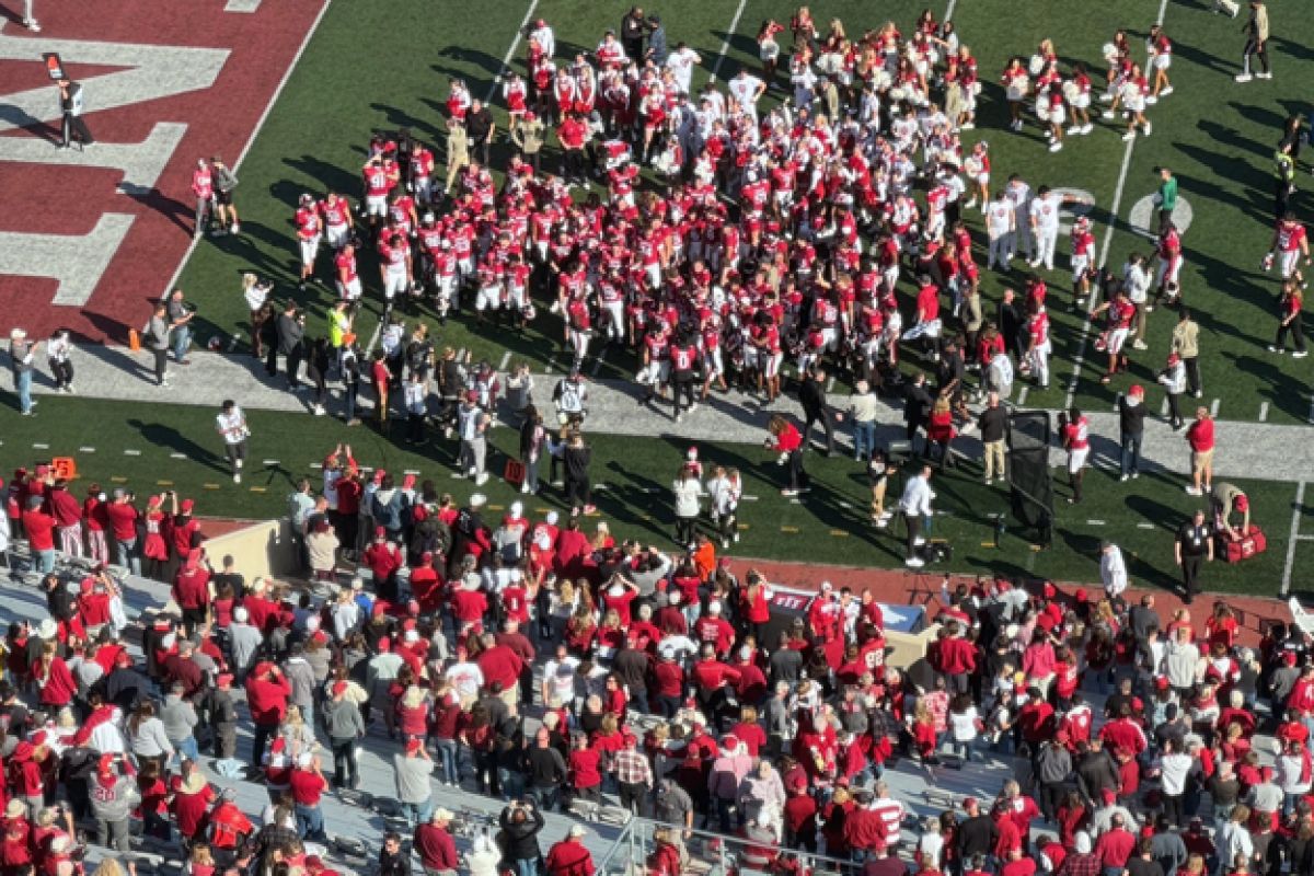 The IU football team sings the school song with the crowd after Saturday's win over Wisconsin.