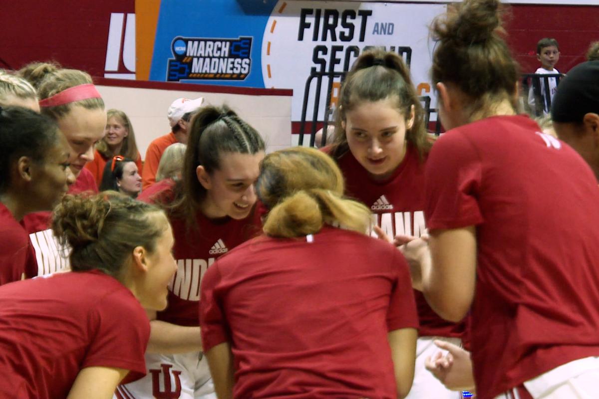 The Indiana women's basketball team huddles before Monday's NCAA tournament game against Princeton at Simon Skjodt Assembly Hall.