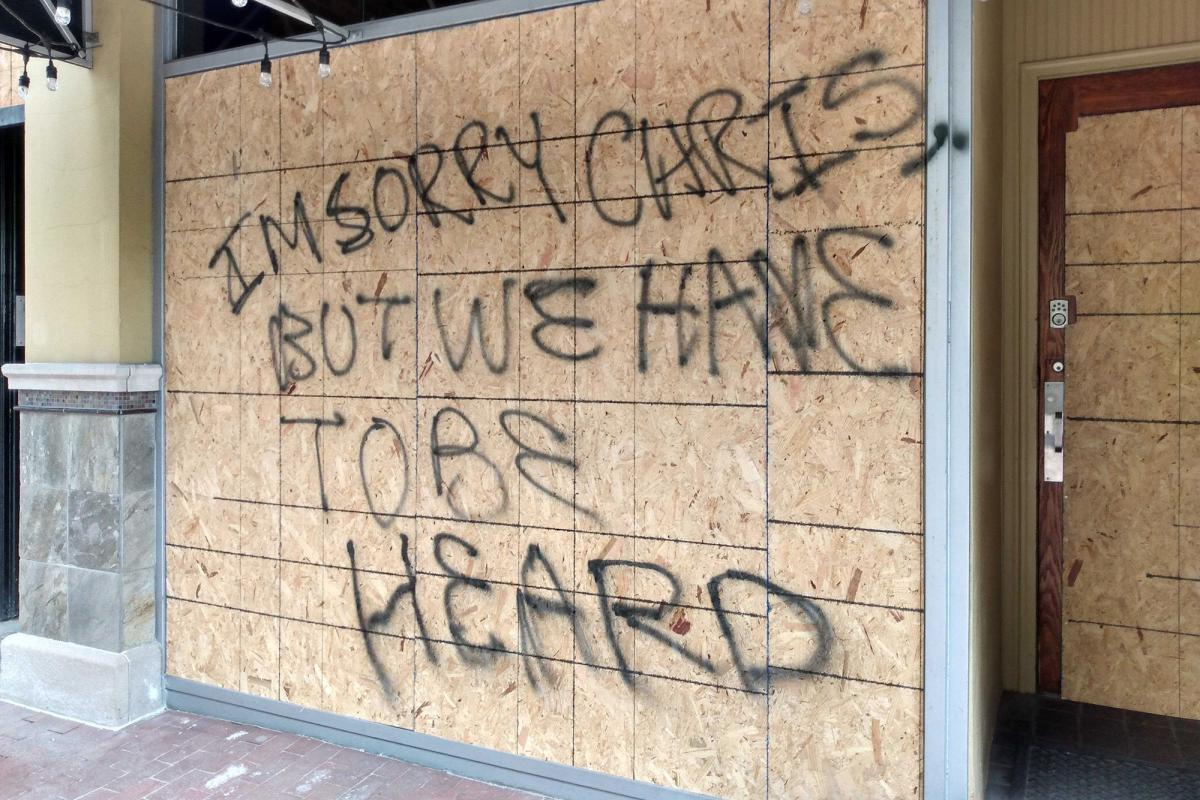 Protesters left a message for the owner of Jack's Donuts in Indianapolis after the clashes with police in June 2020.