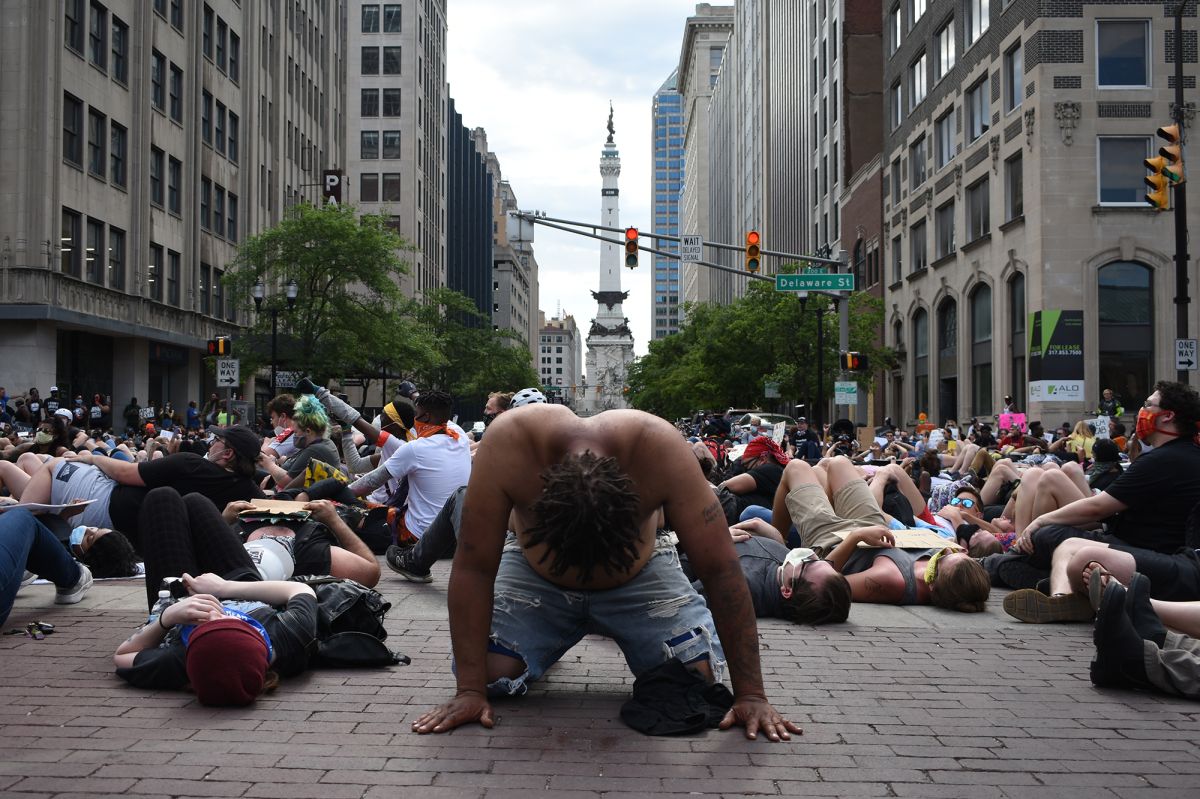 Protesters in downtown Indianapolis stage a "die in" to draw attention to police brutality during the 2020 Black Lives Matter protests. 