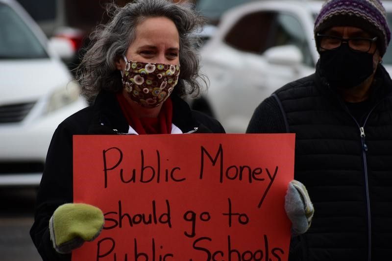 Public school teachers in Goshen organized a protest against legislation to expand school choice in Indiana on Feb. 24.