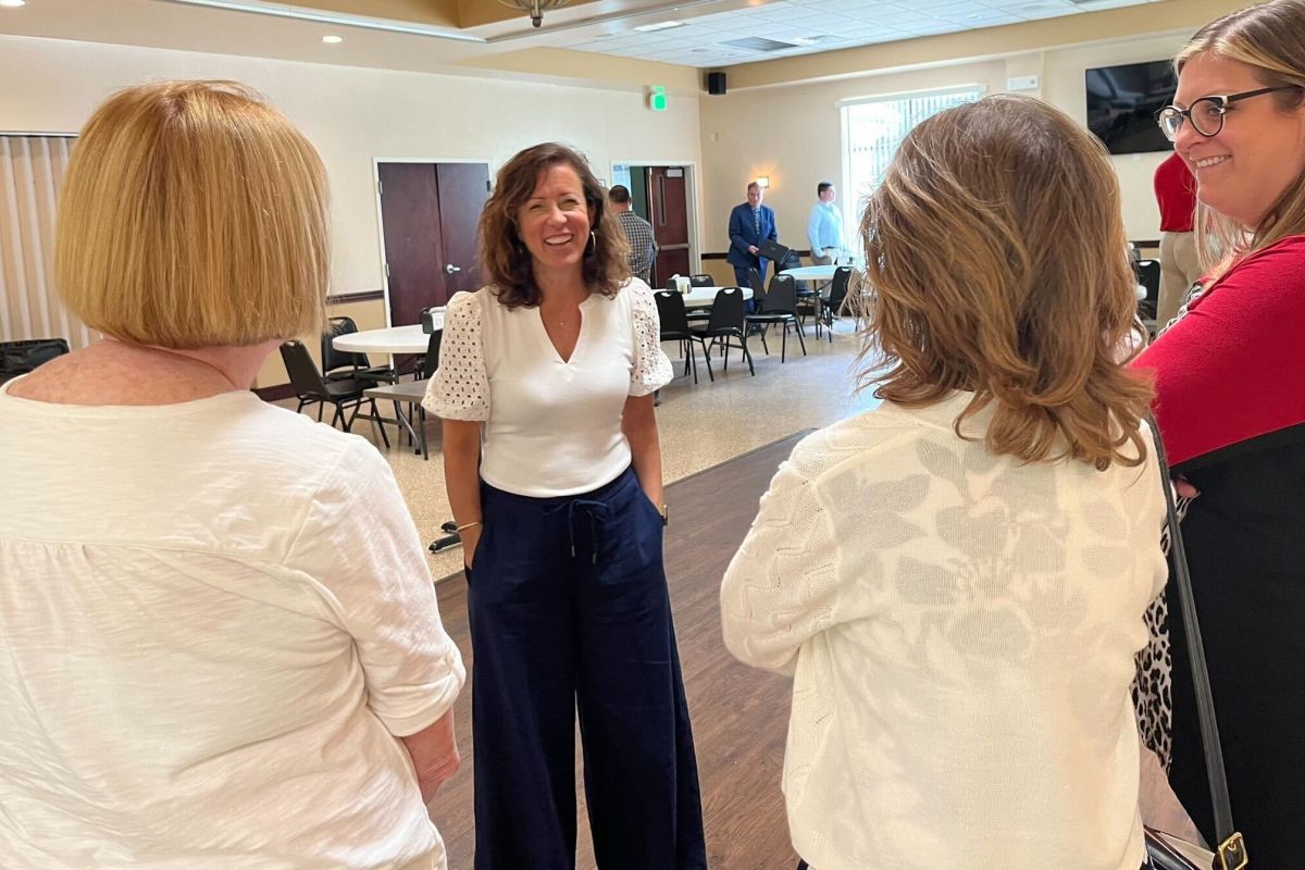 Rep. Julie McGuire, Republican gubernatorial nominee Mike Braun’s choice for lieutenant governor, meets with delegates at an event in Lafayette.