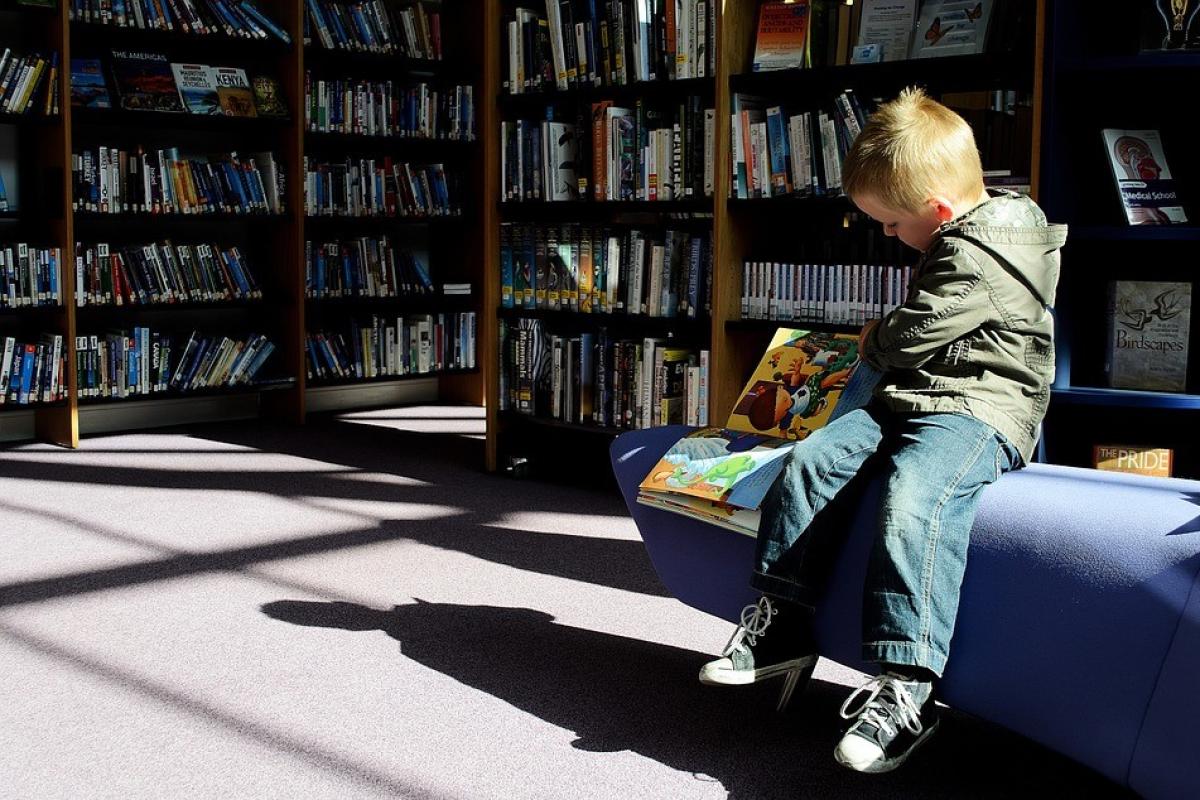 A child reads in a library.