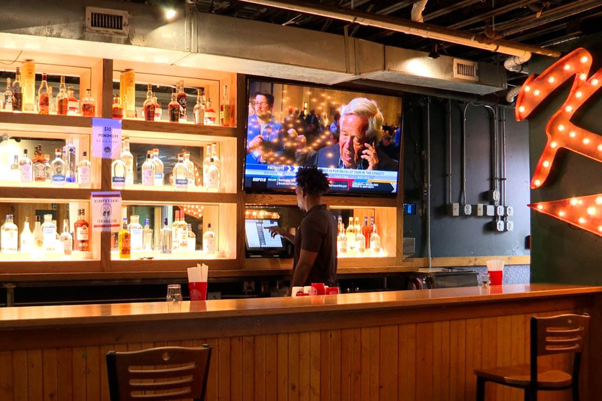 A bartender rings up an order at Kilroy's on Kirkwood.