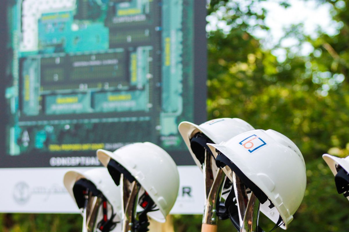 Construction helmets sit atop shovels at the ceremonial groundbreaking of the first project of READI 2.0, a housing development in Kokomo, on July 16, 2024.