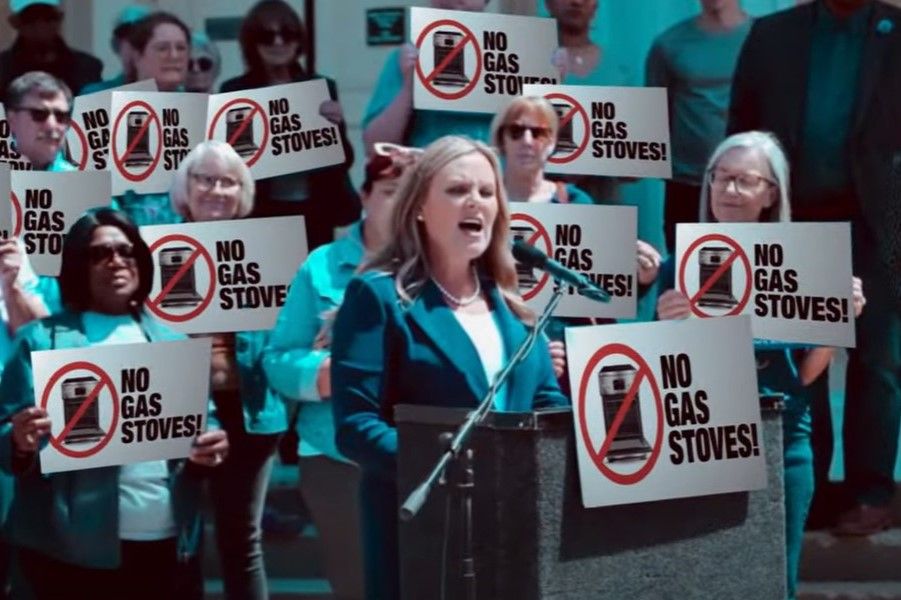 A new negative advertisement from Republican Mike Braun digitally altered the campaign signs at this Jennifer McCormick rally to say “No Gas Stoves!” The version sent to telesivions “mistakenly” omitted the legally mandated disclaimer at the bottom o