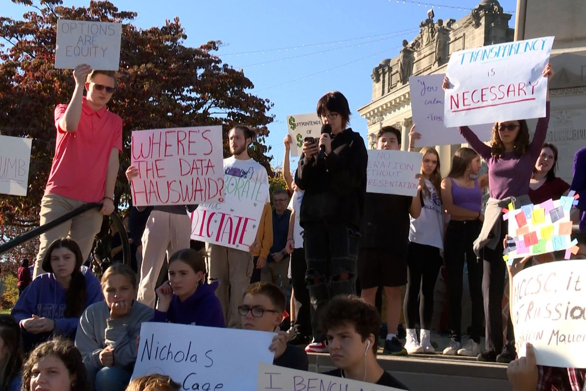 A student speaks during a rally against MCCSC's announced high school schedule change Monday at the courthouse.