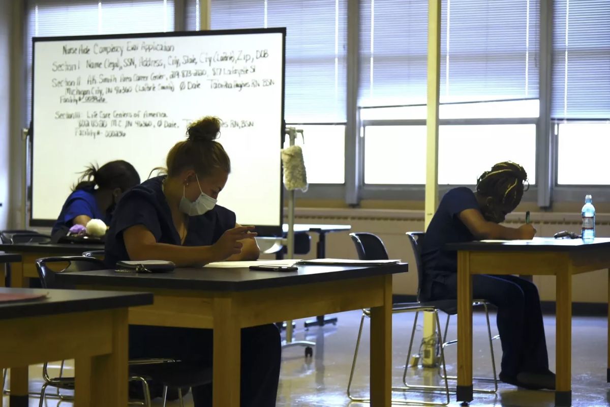 Certified nursing assistant students take an exam at AK Smith Career Academy in Michigan City.