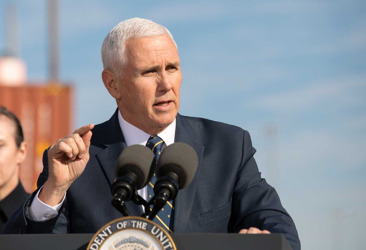 Vice president mike pence speaks at a podium in 2019