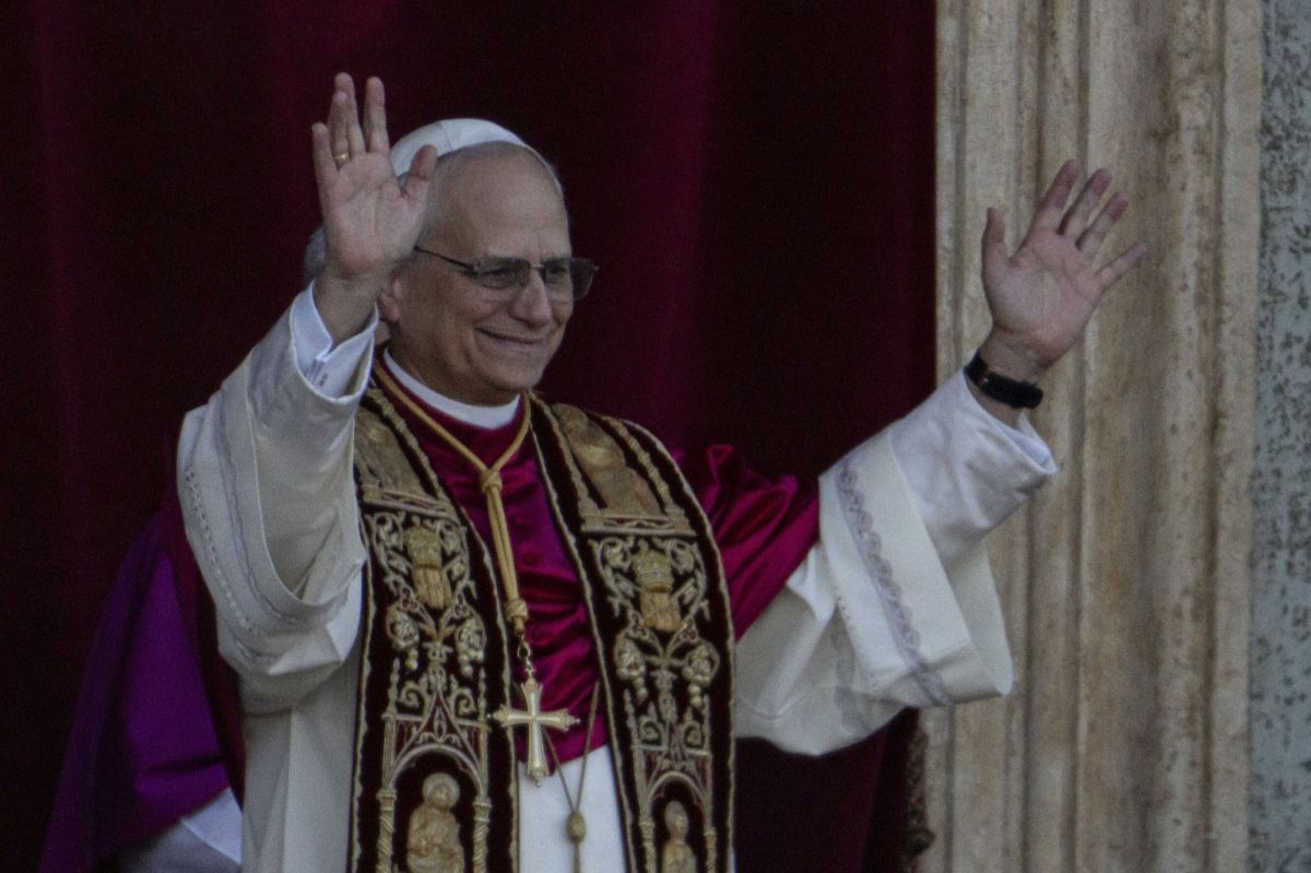 Newly elected Pope Leo XIV, left, formerly Cardinal Robert Francis Prevost