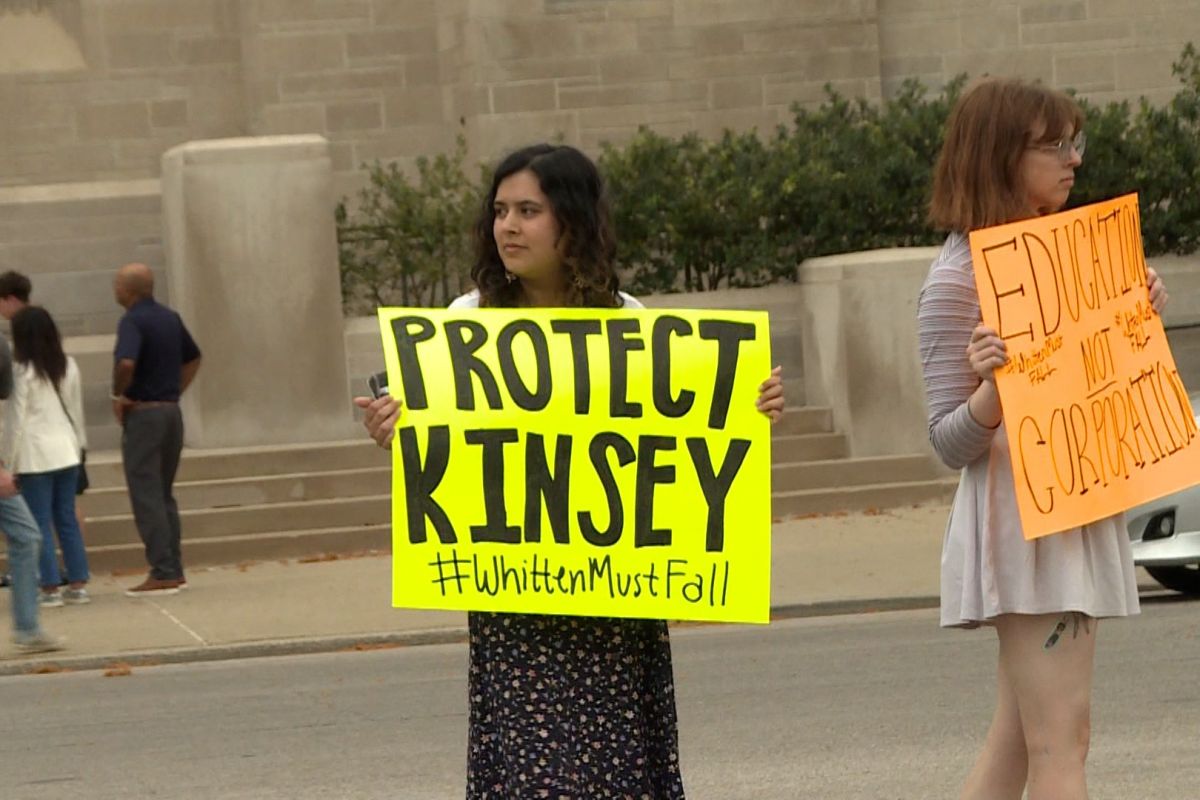 A small group of protesters with the Green Feather Movement and other campus organizations rallied outside of the IU Auditorium before the faculty vote April 17, 2024.