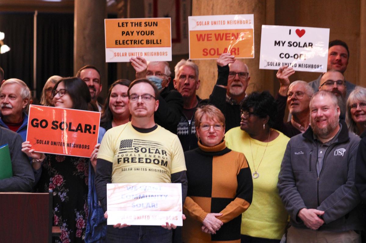 Solar advocates at the 2023 Renewable Energy Day at the Indiana Statehouse. Some speakers at the event condemned Indiana utilities' influence on lawmakers.