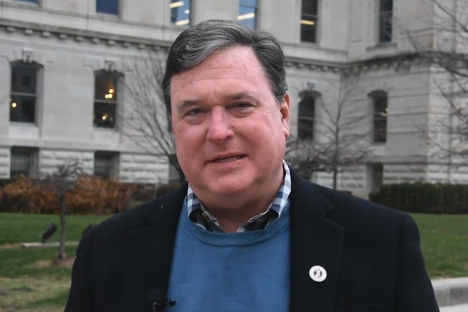 Indiana Attorney Todd Rokita is pictured in front of the Statehouse in an official video.