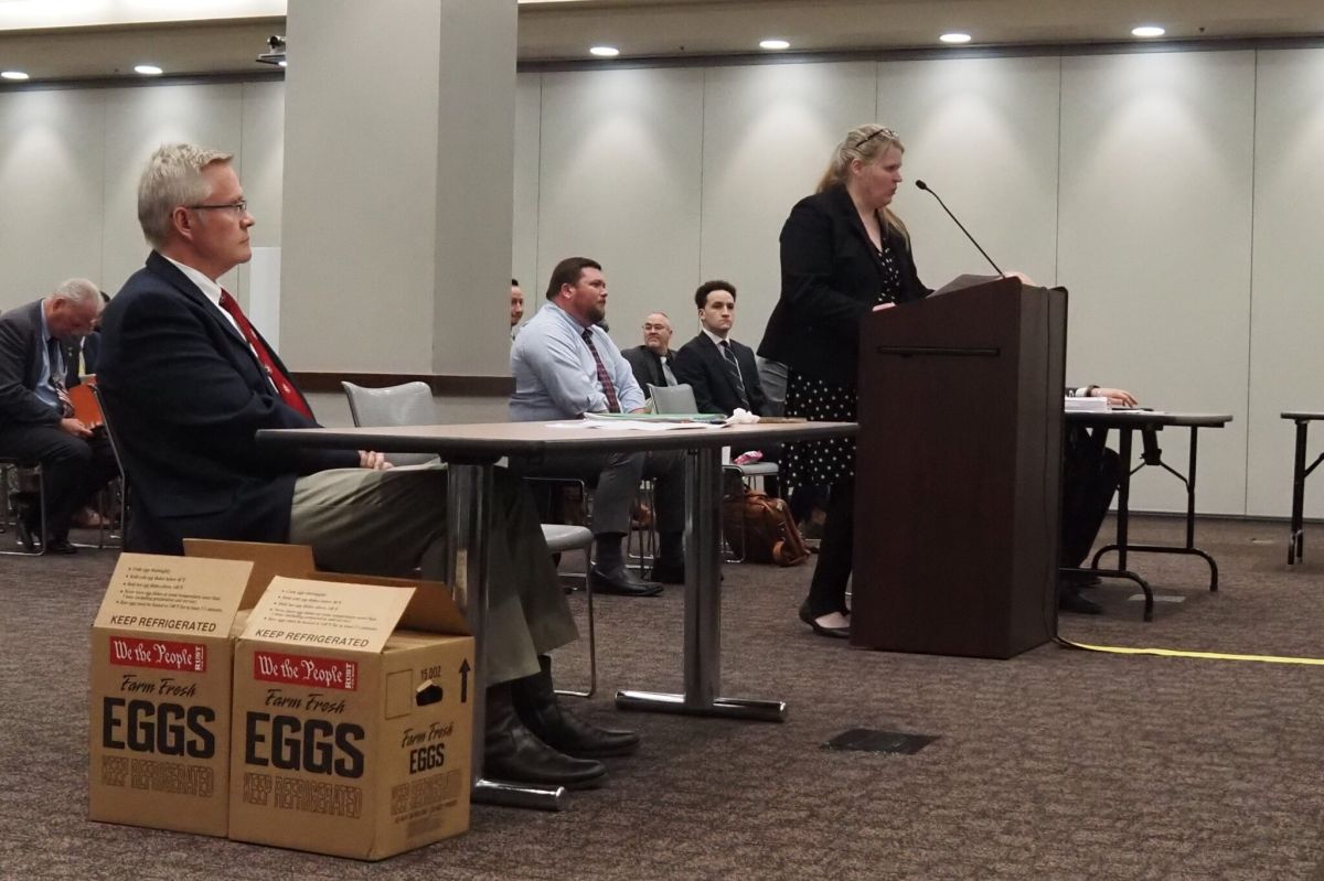 U.S. Senate hopeful John Rust and his attorney, Michelle Harter, appear before the Indiana Election Commission on Tuesday, Feb. 27, 2024, in Indianapolis.