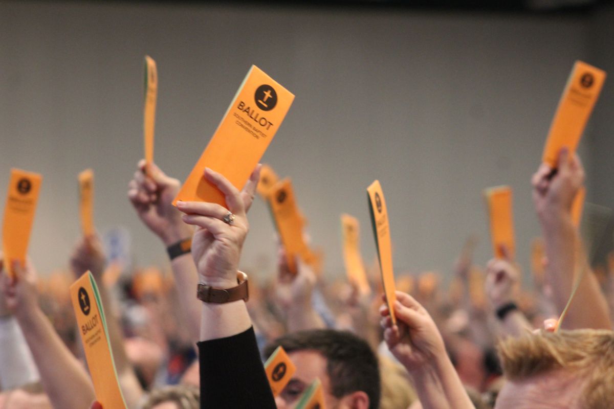 Members of the Southern Baptist Convention raise their ballots during a vote. The convention approved a resolution opposing in vitro fertilization on Wednesday, June 12, 2024 at the Indiana Convention Center in Indianapolis.