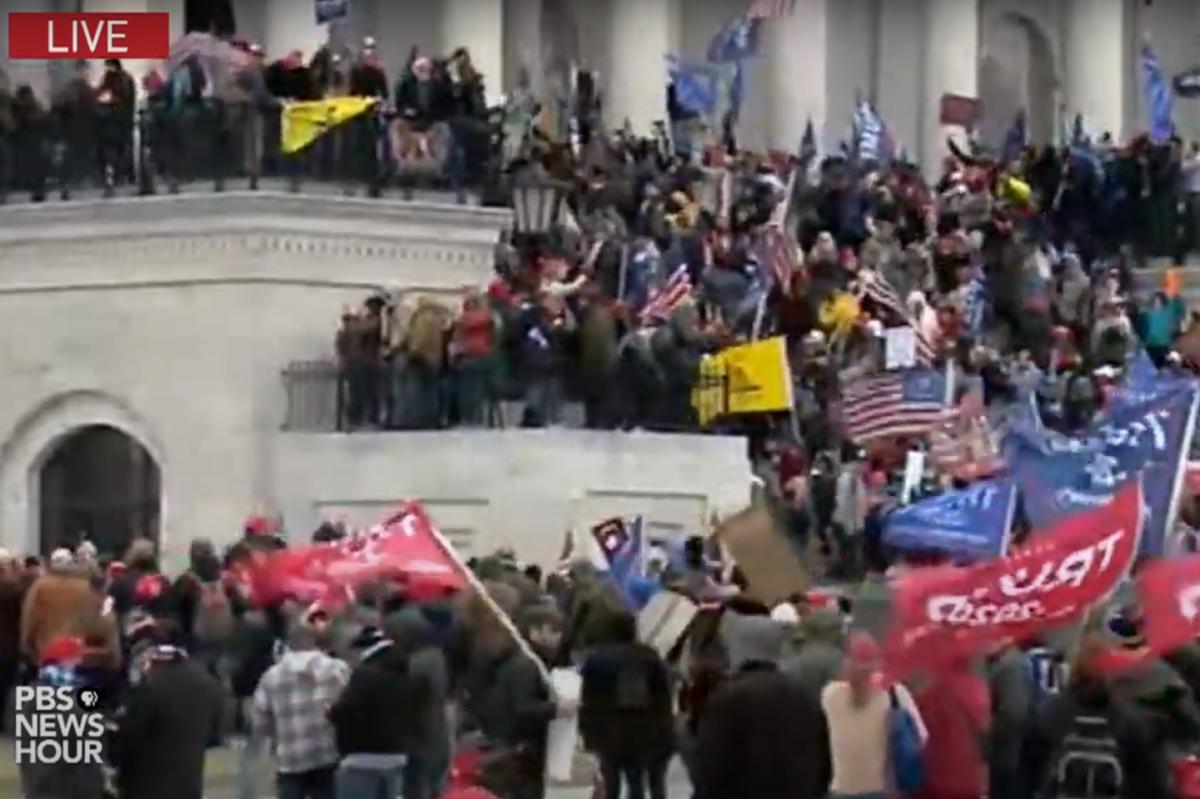 A screenshot of PBS Newshour coverage of the protesting at the U.S. Capitol, Jan. 6 2021.