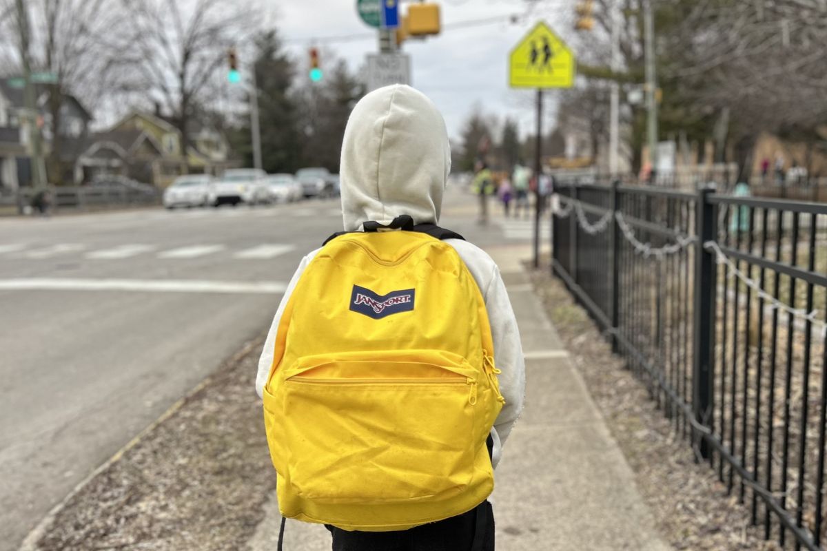 student-backpack-walking