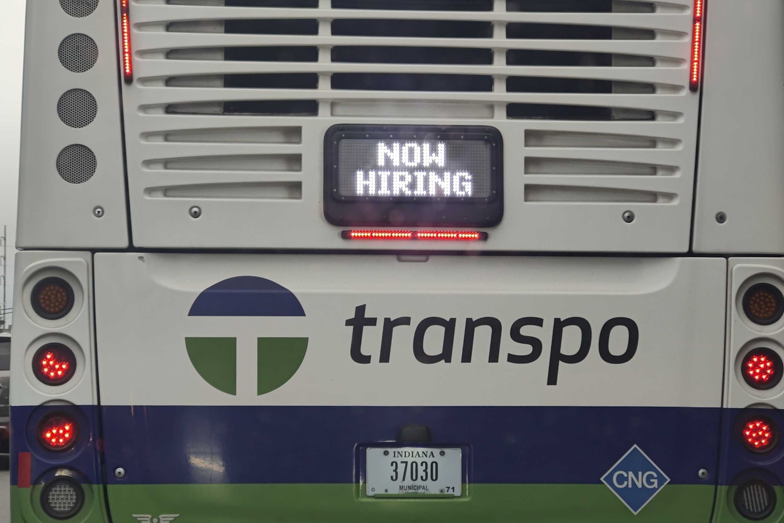 now hiring bus sign