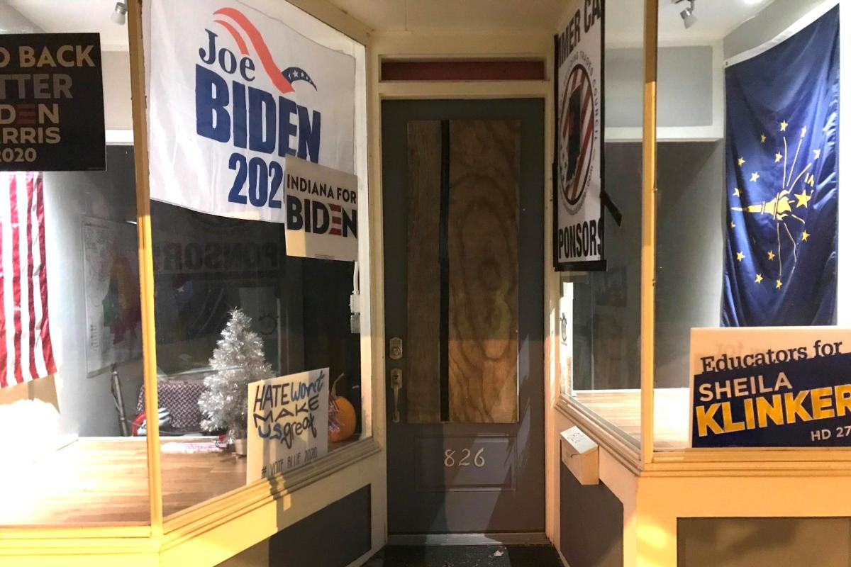 The door to the Tippecanoe County Democrats' HQ boarded up after shots were fired into it Jan 7, 2020.