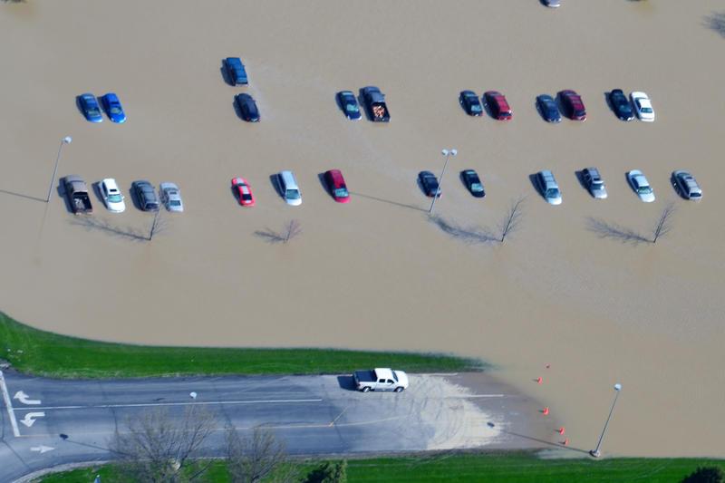 Parked cars in Tipton during the flood of 2013.