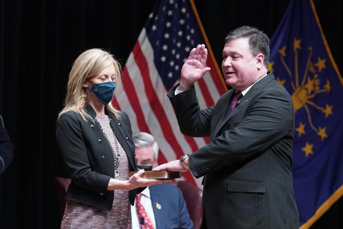 Todd Rokita, alongside his wife Kathy, is sworn in as Indiana's new attorney general.