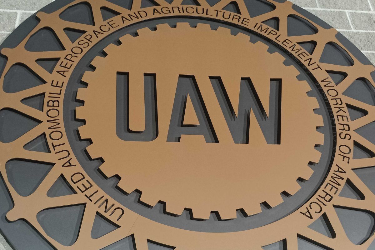 UAW metal seal sign 