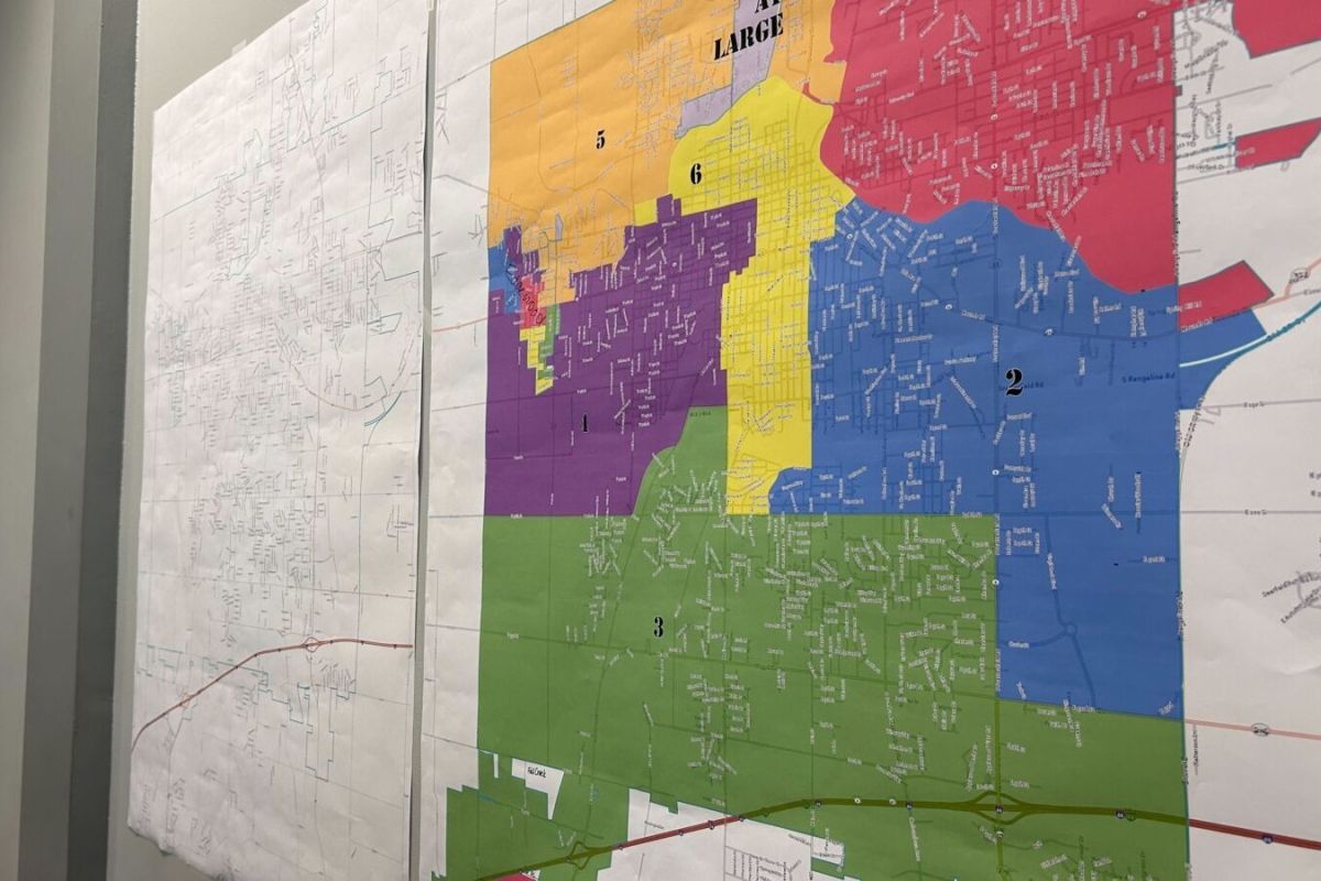 Anderson officials display the proposed new voting districts at a June 2024 meeting. 