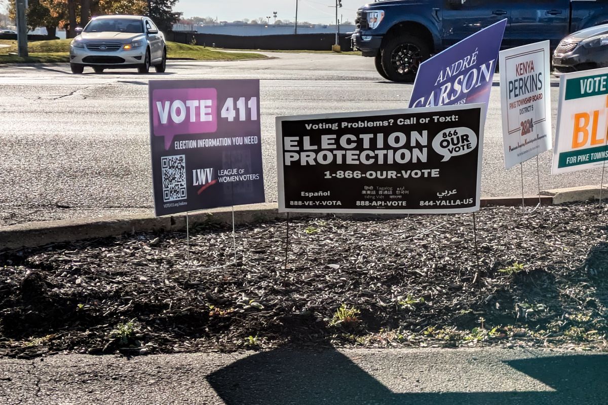 Lawn signs at a polling place.