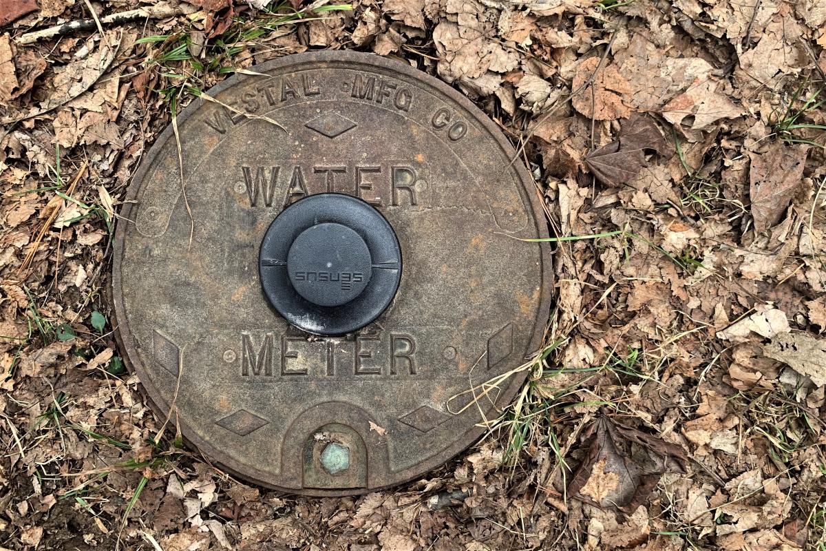 A water meter cap from the City of Bloomington Utilities.