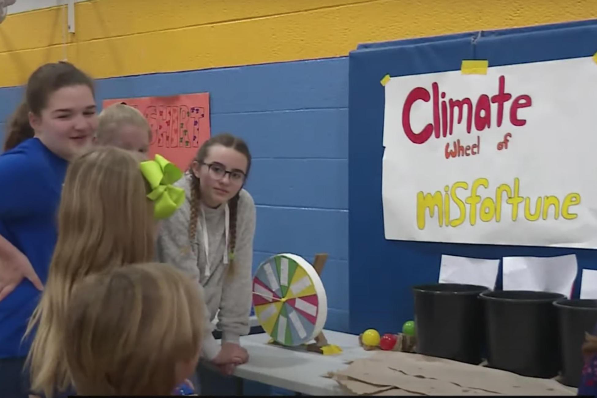 Middle schoolers at Center for Inquiry School 27 in Indianapolis hold a fair to teach younger kids about climate change in March 2019.