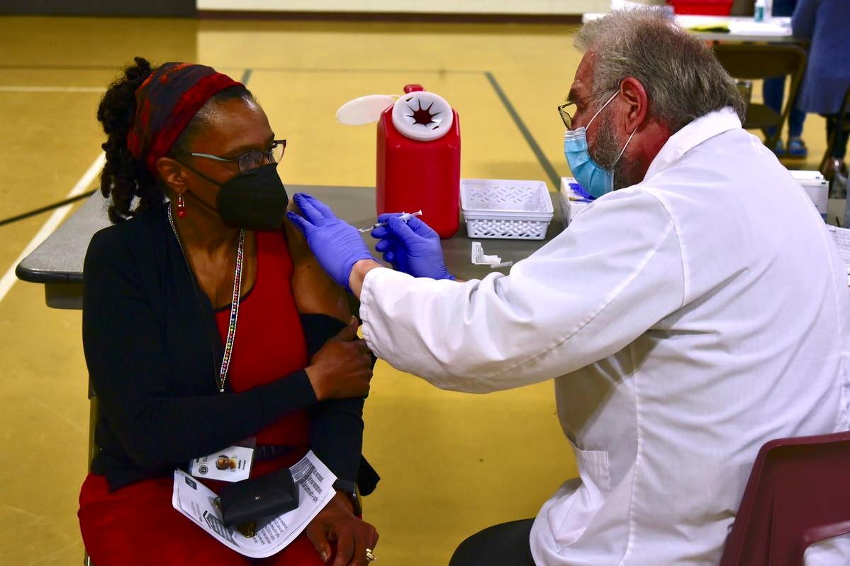 An Indiana teacher gets the COVID-19 vaccine in Elkhart.