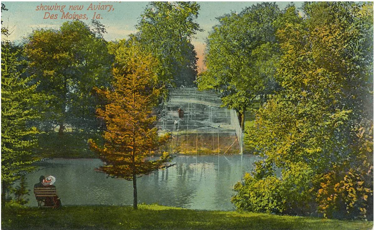 postcard of two people by a lake