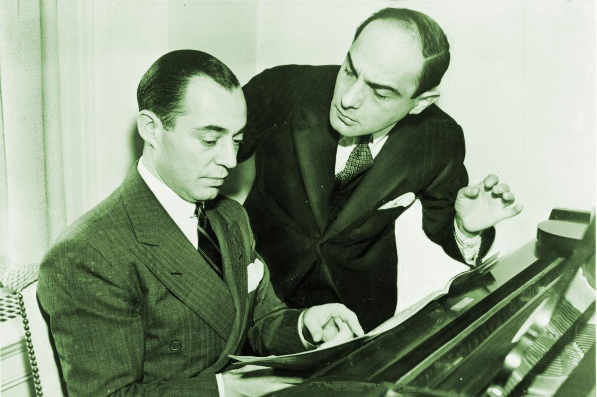 The stoic Richard Rodgers (at the piano) and the mercurial Lorenz Hart, composers of songs like "Manhattan," "Isn't It Romantic," and "Blue Moon."