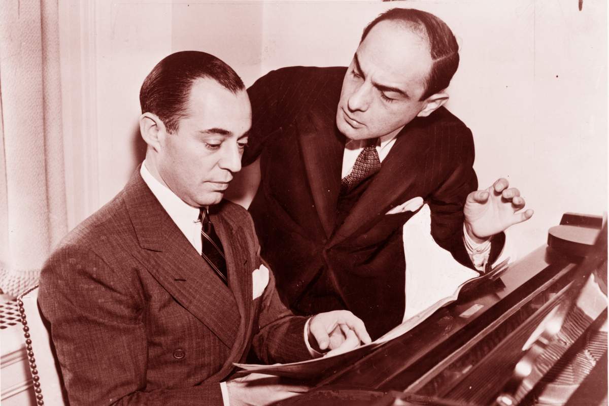 Composer Richard Rodgers (seated) and lyricist Larry Hart collaborated until Hart's untimely death in 1943.