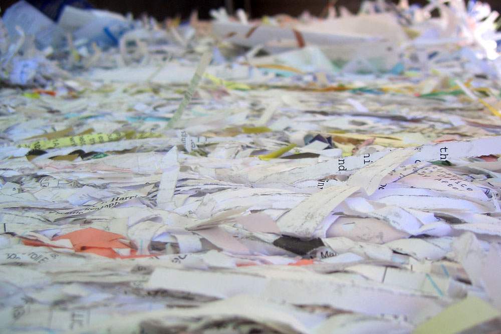 a pile of shredded recycling paper