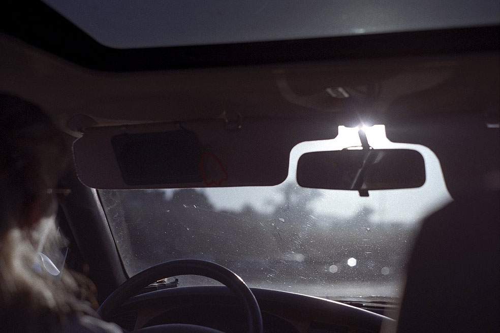 windshield with woman on left side