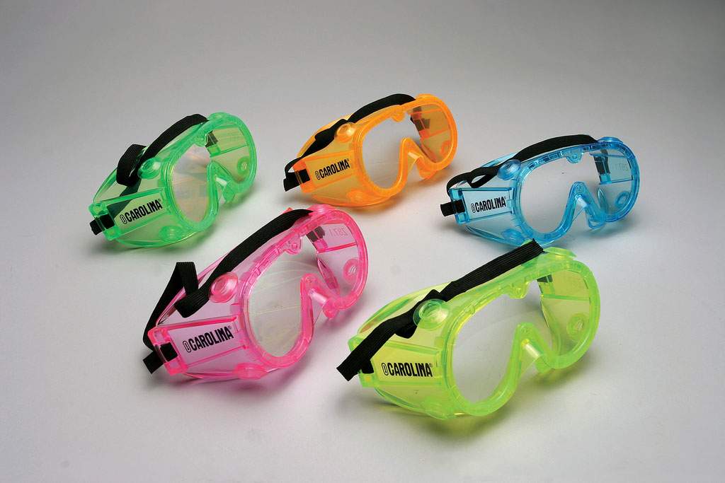 Goggles in different colors on a gray background