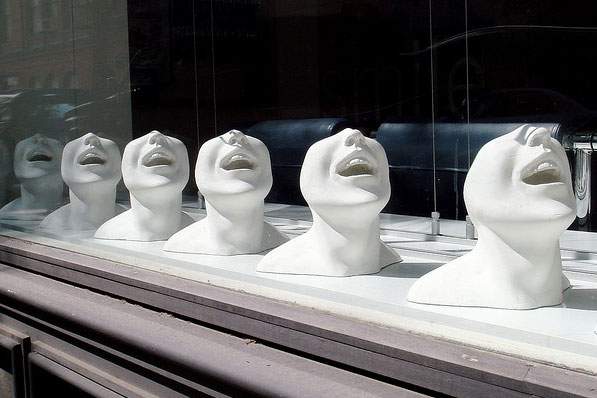 statues of people laughing