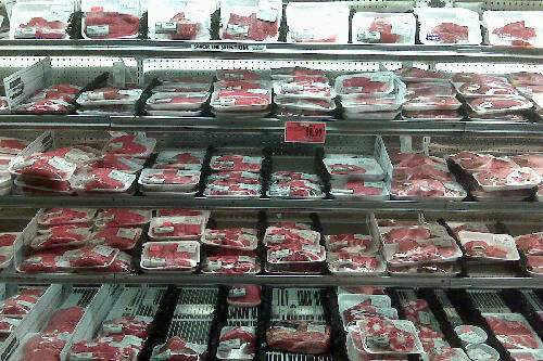 meat in the grocer's freezer