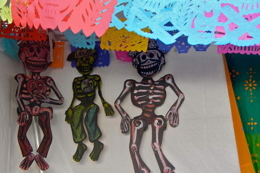 Dancing skeletons are used as decor for Day of the Dead celebrations.