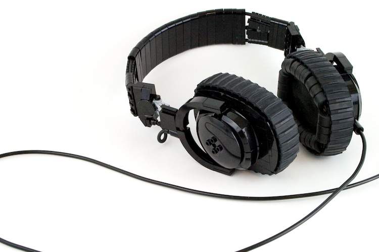 A pair of black headphones against a white background